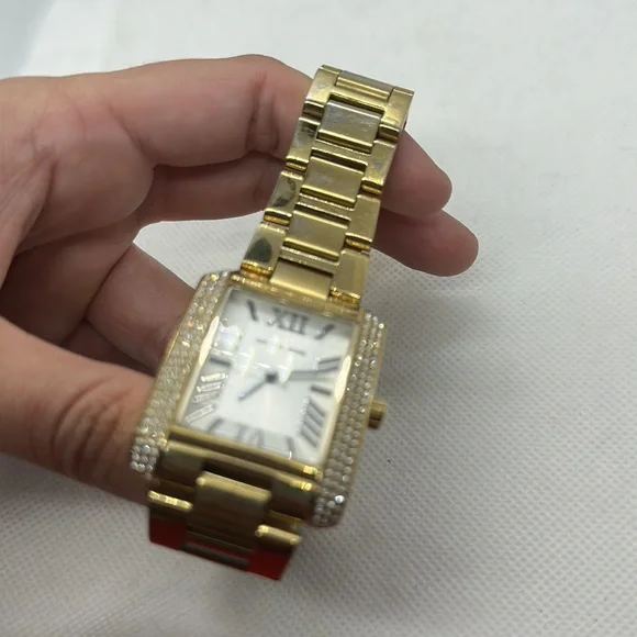 Michael Kors Emery Three-Hand Gold-Tone Stainless Steel Watch - Picture 3 of 4